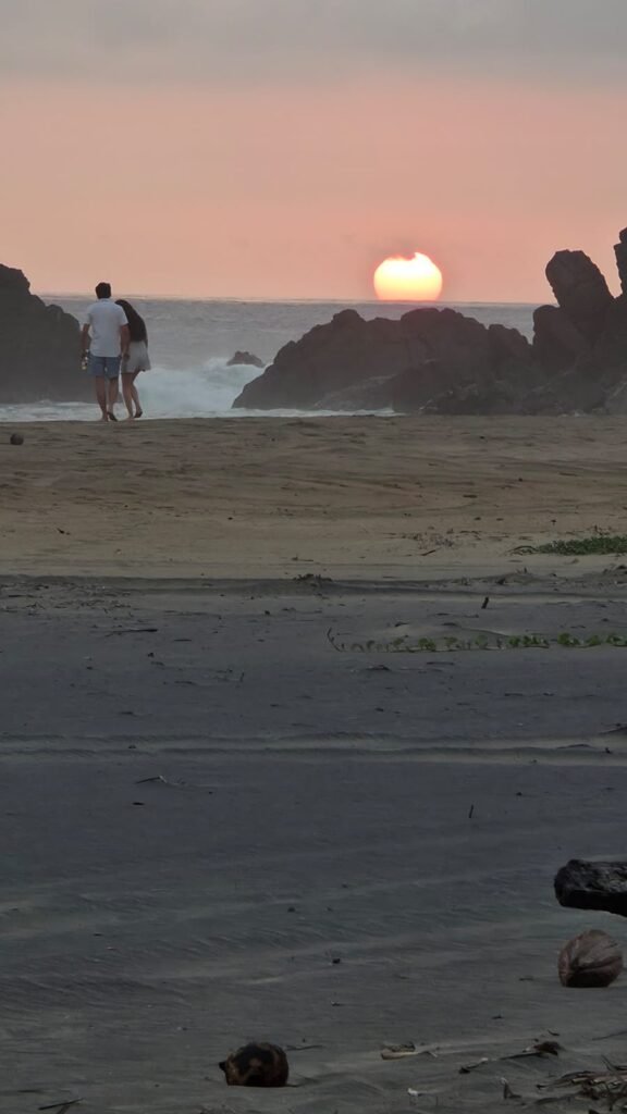 CoupleonBeachSunsetatDavesOpenHouse03142025